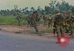 Image of US Army soldiers in field Vietnam, 1968, second 28 stock footage video 65675040364