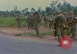 Image of US Army soldiers in field Vietnam, 1968, second 29 stock footage video 65675040364