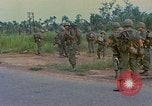 Image of US Army soldiers in field Vietnam, 1968, second 30 stock footage video 65675040364