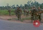 Image of US Army soldiers in field Vietnam, 1968, second 31 stock footage video 65675040364