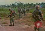 Image of US Army soldiers in field Vietnam, 1968, second 41 stock footage video 65675040364