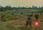 Image of US Army soldiers in field Vietnam, 1968, second 47 stock footage video 65675040364