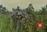 Image of US Army soldiers in field Vietnam, 1968, second 55 stock footage video 65675040364