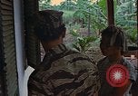 Standbild vietnamesischen Interpreter Vietnam, 1968, aus Sekunde 35 historischem Filmmaterial Videoclip 65675040365