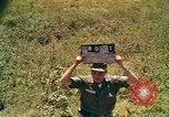 Image of Scenic view of a village Vietnam, 1965, second 1 stock footage video 65675040375