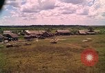 Image of Scenic view of a village Vietnam, 1965, second 16 stock footage video 65675040375