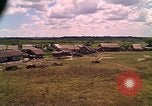 Image of Scenic view of a village Vietnam, 1965, second 22 stock footage video 65675040375