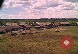 Image of Scenic view of a village Vietnam, 1965, second 24 stock footage video 65675040375