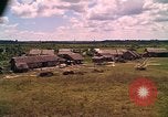 Image of Scenic view of a village Vietnam, 1965, second 26 stock footage video 65675040375