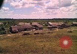 Image of Scenic view of a village Vietnam, 1965, second 27 stock footage video 65675040375