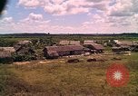 Image of Scenic view of a village Vietnam, 1965, second 31 stock footage video 65675040375