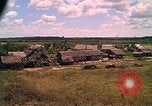 Image of Scenic view of a village Vietnam, 1965, second 32 stock footage video 65675040375