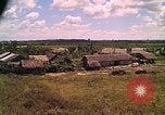 Image of Scenic view of a village Vietnam, 1965, second 34 stock footage video 65675040375