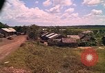 Image of Scenic view of a village Vietnam, 1965, second 41 stock footage video 65675040375