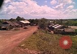 Image of Scenic view of a village Vietnam, 1965, second 49 stock footage video 65675040375