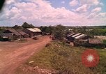 Image of Scenic view of a village Vietnam, 1965, second 52 stock footage video 65675040375