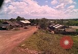 Image of Scenic view of a village Vietnam, 1965, second 53 stock footage video 65675040375