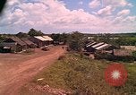 Image of Scenic view of a village Vietnam, 1965, second 54 stock footage video 65675040375
