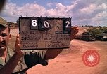 Image of Scenic view of a village Vietnam, 1965, second 57 stock footage video 65675040375