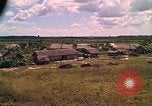 Image of Scenic view of a village Vietnam, 1965, second 58 stock footage video 65675040375