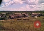 Image of Scenic view of a village Vietnam, 1965, second 59 stock footage video 65675040375