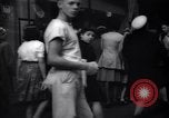 Image of Crowded Los Angeles Street during World War II Los Angeles California USA, 1944, second 51 stock footage video 65675040414