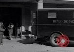 Immagine di Argento portare valuta mix-up Città del Messico MESSICO, 1934, secondo 23 filmato di repertorio 65675040418