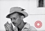 Image of Liberated prisoner Bob Jones from Los Baños Manila Philippines, 1945, second 56 stock footage video 65675040437