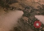 Image of strafing Japanese buildings Pacific Theater, 1945, second 3 stock footage video 65675040473