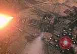 Image of strafing Japanese buildings Pacific Theater, 1945, second 4 stock footage video 65675040473