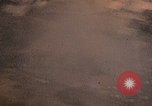 Image of strafing Japanese buildings Pacific Theater, 1945, second 6 stock footage video 65675040473