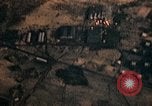 Image of strafing Japanese buildings Pacific Theater, 1945, second 8 stock footage video 65675040473