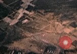 Image of strafing Japanese buildings Pacific Theater, 1945, second 9 stock footage video 65675040473