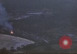 Image of fire in jungle Pacific Theater, 1945, second 6 stock footage video 65675040477