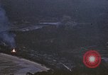 Image of fire in jungle Pacific Theater, 1945, second 8 stock footage video 65675040477