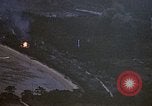 Image of fire in jungle Pacific Theater, 1945, second 10 stock footage video 65675040477