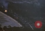 Image of fire in jungle Pacific Theater, 1945, second 11 stock footage video 65675040477