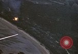 Image of fire in jungle Pacific Theater, 1945, second 13 stock footage video 65675040477