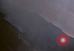 Image of fire in jungle Pacific Theater, 1945, second 19 stock footage video 65675040477