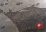 Image of strafing Okinawa Ryukyu Islands, 1945, second 32 stock footage video 65675040494