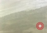Standbild strafing Okinawa Ryukyu Inseln, 1945, aus Sekunde 11 historischem Filmmaterial Videoclip 65675040495