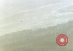 Standbild strafing Okinawa Ryukyu Inseln, 1945, aus Sekunde 12 historischem Filmmaterial Videoclip 65675040495