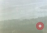 Standbild strafing Okinawa Ryukyu Inseln, 1945, aus Sekunde 13 historischem Filmmaterial Videoclip 65675040495
