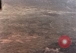 Standbild US-Flugzeuge strafing Ziele auf Okinawa Okinawa Ryukyu Inseln, 1945, aus Sekunde 23 historischem Filmmaterial Videoclip 65675040496