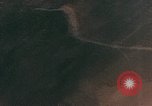 Image of Gun camera records U.S. Aircraft strafing targets on Okinawa in World  Okinawa Ryukyu Islands, 1945, second 5 stock footage video 65675040497