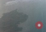 Image of Gun camera records U.S. Aircraft strafing targets on Okinawa in World  Okinawa Ryukyu Islands, 1945, second 9 stock footage video 65675040497