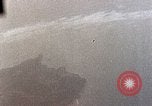 Image of Gun camera records U.S. Aircraft strafing targets on Okinawa in World  Okinawa Ryukyu Islands, 1945, second 11 stock footage video 65675040497