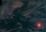 Image of Gun camera records U.S. Aircraft strafing targets on Okinawa in World  Okinawa Ryukyu Islands, 1945, second 14 stock footage video 65675040497