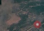 Image of Gun camera records U.S. Aircraft strafing targets on Okinawa in World  Okinawa Ryukyu Islands, 1945, second 18 stock footage video 65675040497