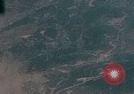 Image of Gun camera records U.S. Aircraft strafing targets on Okinawa in World  Okinawa Ryukyu Islands, 1945, second 19 stock footage video 65675040497